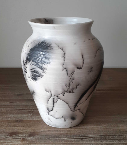 https://motherearthpotteryza.com/cdn/shop/products/naked-raku-ceramics-pottery-vase-decor-3_large.jpg?v=1614543019